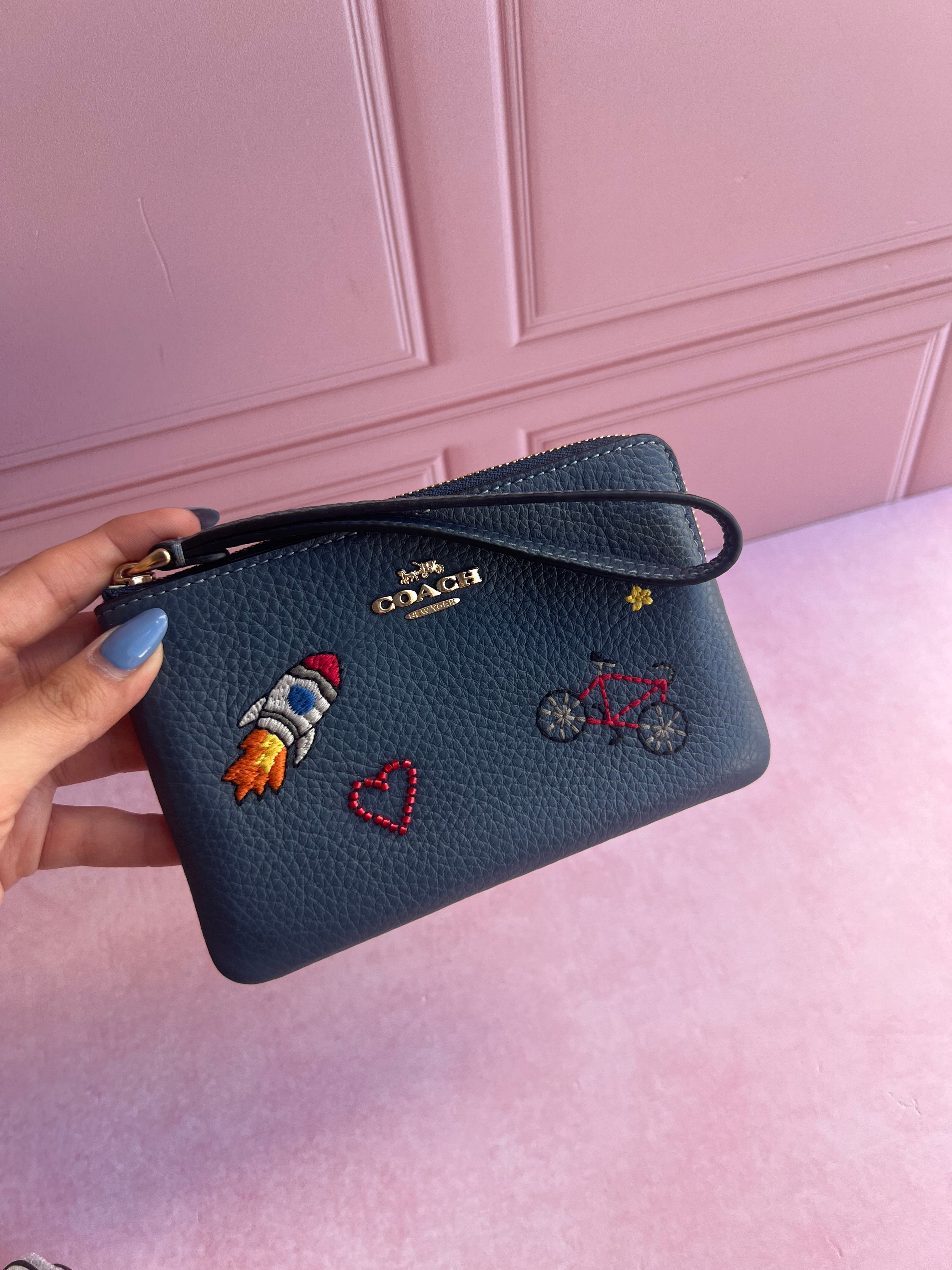 Wristlet Coach sencilla con estampado